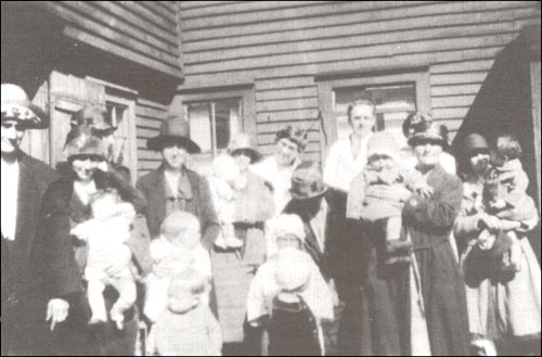 photo of several adults and children
