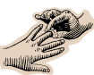 A hand putting a wedding ring on another hand